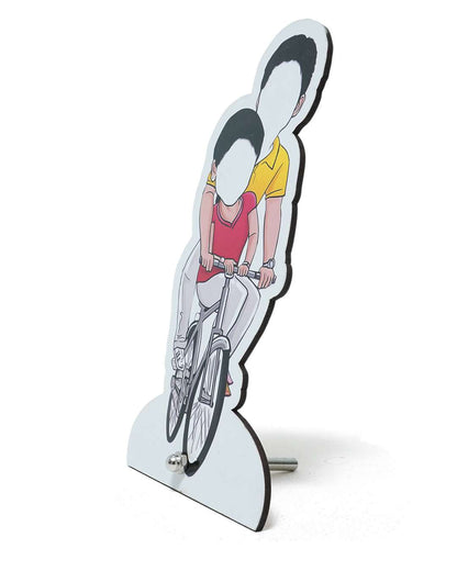 Couple Riding a bicycle