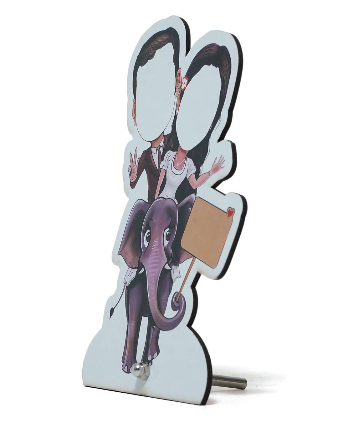 Couple Riding on Elephant